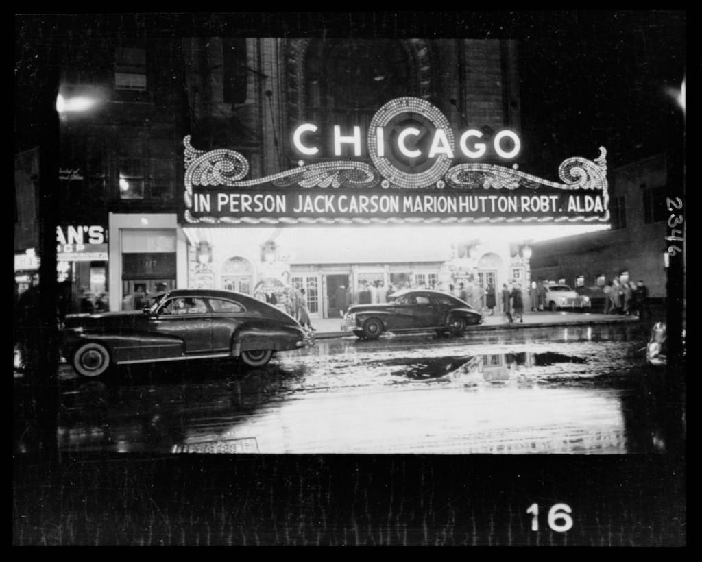 People arriving at a Chicago theater for show starring, in person, Jack Carson, Marion Hutton, and Robert Alda